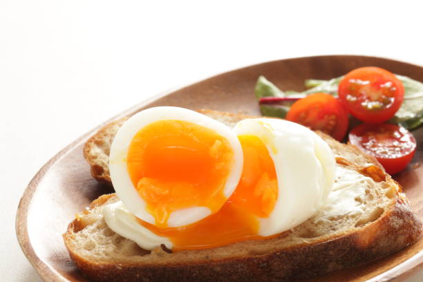 istock soft boiled egg on cream cheese toast for gourmet comfort breakfast 1245393957