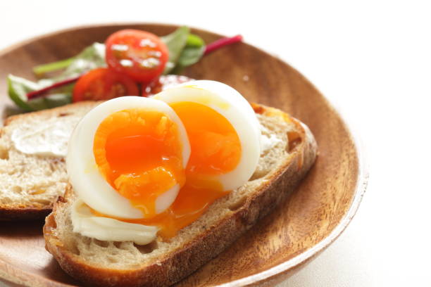istock soft boiled egg on cream cheese toast for gourmet comfort breakfast 1245393963