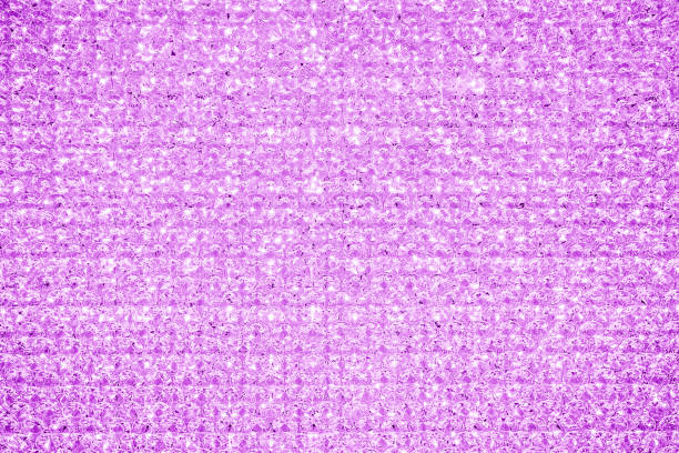 istock Pink violet crystal glitter texture background. Glittery shiny lights 1245396568