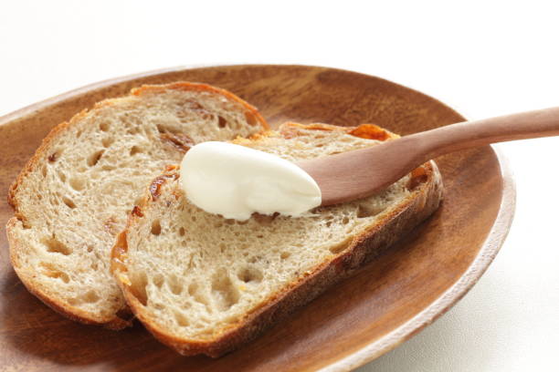 Cream cheese and French bread for comfort breakfast White background and copy space cream cheese photos stock pictures, royalty-free photos & images