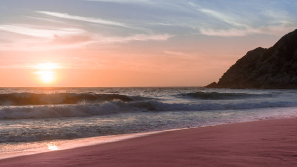 Sunset over Gray Whale Cove State Beach