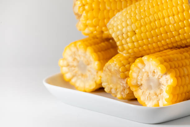 istock Soft yellow and cooked corn in the pan. 1245452825