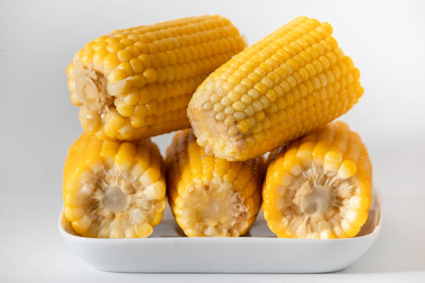 istock Soft yellow and cooked corn in the pan. 1245454523
