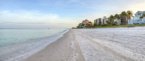 istock Vanderbilt Beach at sunrise with a calm ocean 1245460132