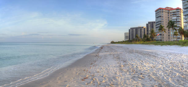istock Vanderbilt Beach at sunrise with a calm ocean 1245460635