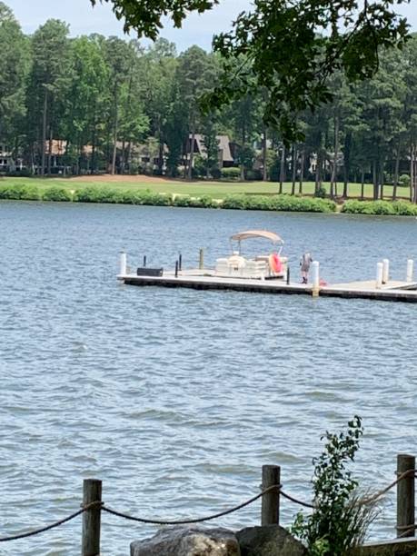 istock Long shot from park of lake 1245465590