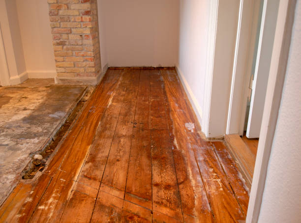 Wood floor in serious need of repair and renovation stock photo