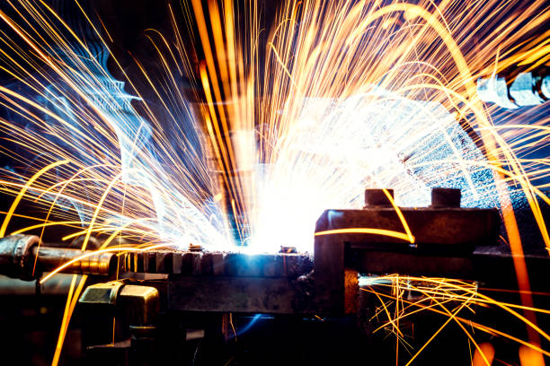 istock Welding robots movement in a car factory 1245536660