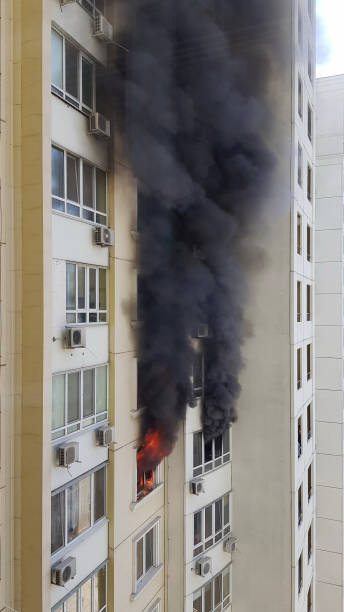 istock Burning fire and blurry black smoke due to arson in building 1245552565