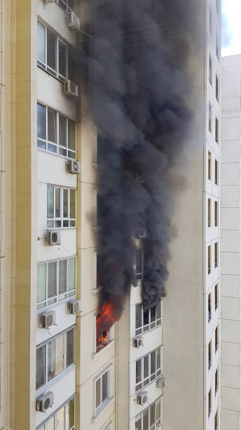 istock Burning fire and blurry black smoke due to arson in building 1245552580