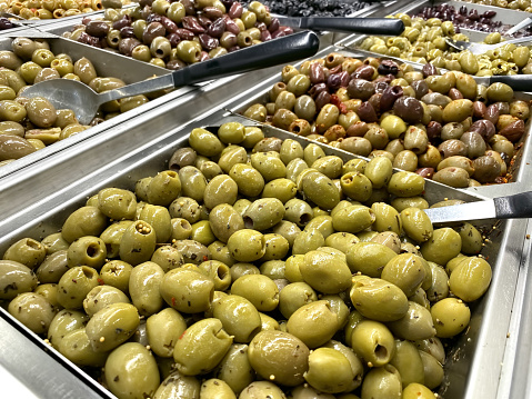 Close up Salad bar with variety of olives