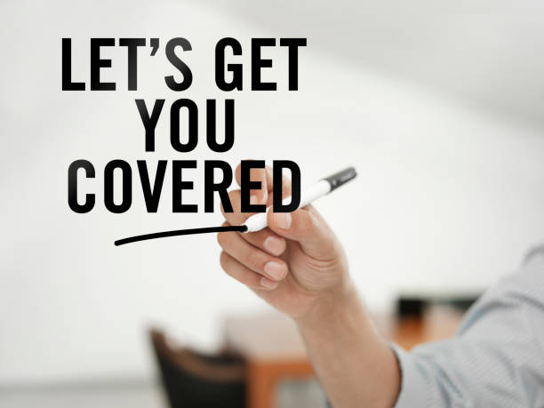Let's get you covered Businessman writing 'Let's get you covered' on virtual screen. transparent wipe board stock pictures, royalty-free photos & images