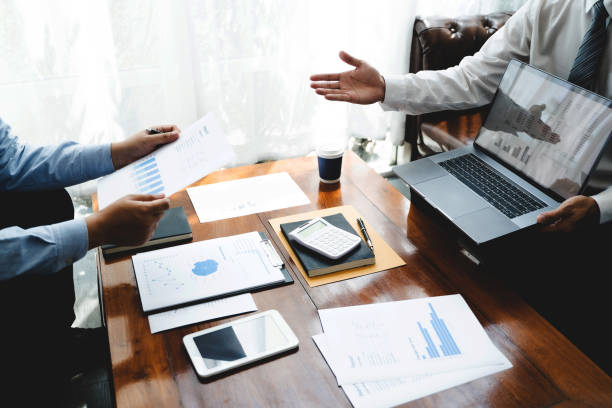 istock Financial inspector calculating a numbers in office room. 1245602602