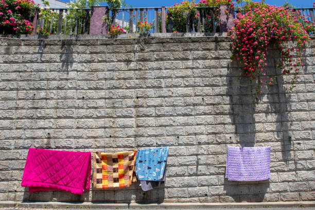 istock Sunny afternoon to dry blankets on the wall 1245614240