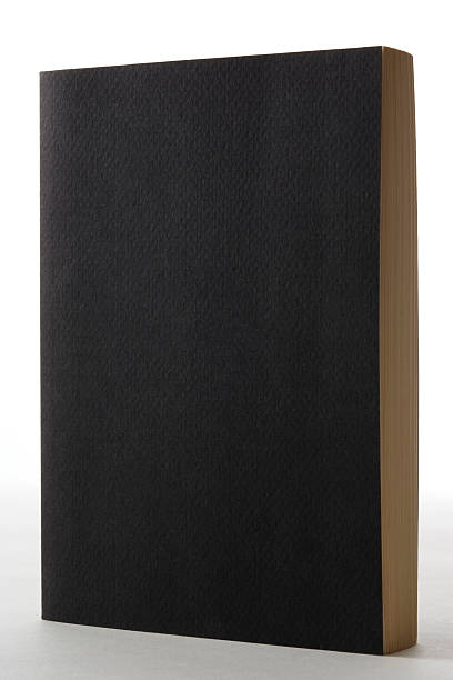 istock Isolated shot of standing blank black book on white background 124564046
