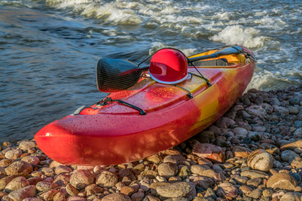 istock whitewater kayak with helmet 1245646397