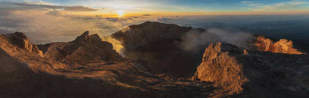 istock sunrise at the top of agung volcano. panoramic 1245656500