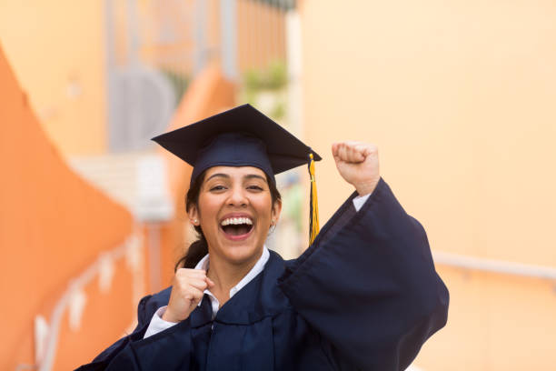 istock Young Hispanic woman graduating 1245695479