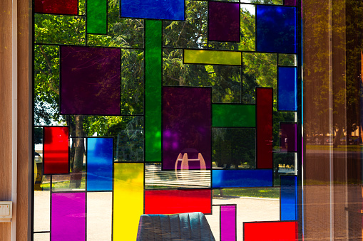 Colored glass on the window, reflection