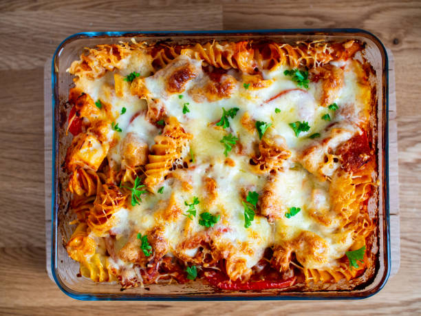 istock Pasta casserole with barbecue chicken breast, cheese and vegetables 1245715842