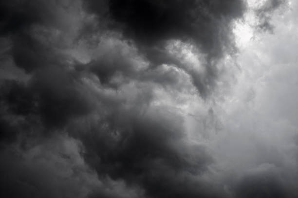 istock Dark sky and dramatic black cloud before rain.A tropical cyclone is a rapidly rotating storm system characterized by a low-pressure center, a closed low-level atmospheric circulation, strong winds. 1245717928