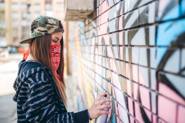 istock Graffiti artist painting 1245719033