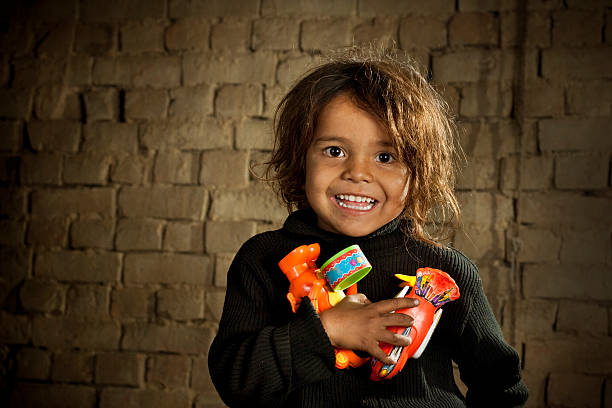 Happy child with toys.