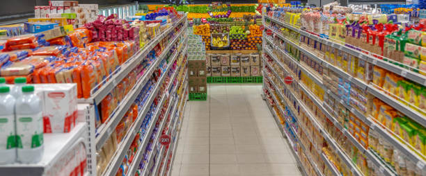 istock Corridor in an empty supermarket with a greengrocery at back 1245726017