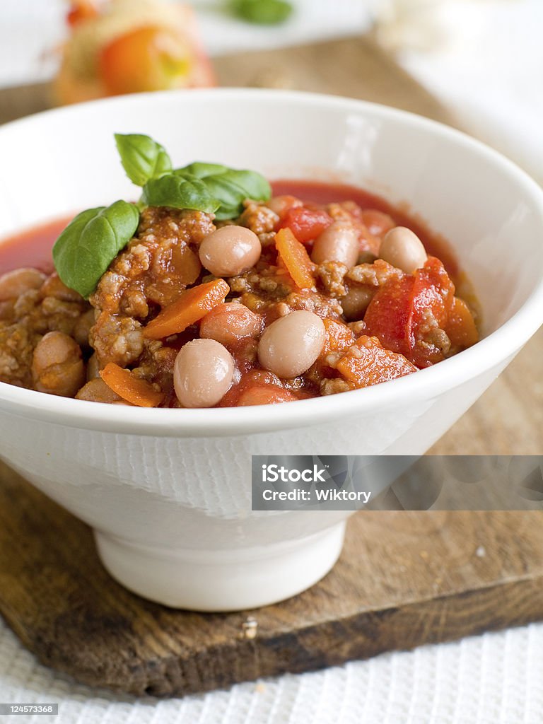 Chile A bowl of chilli with bean and minced meat. Soft focus, shallow depth of field. Basil Stock Photo