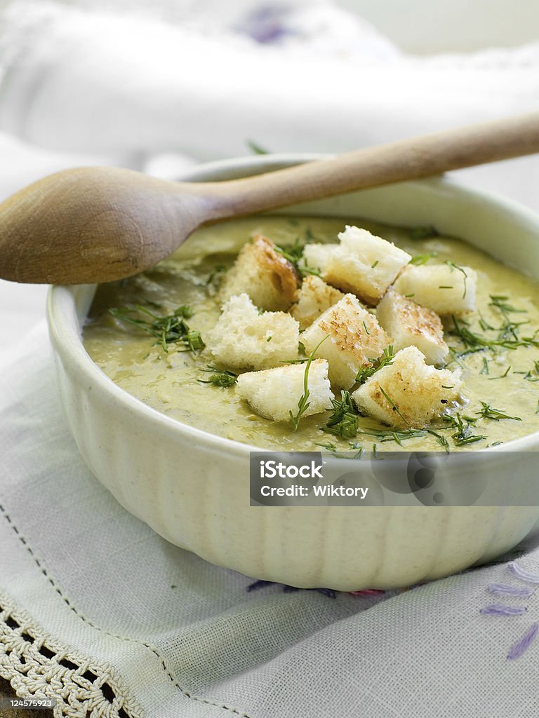 soup A bowl of green vegetable soup with croutons and dill Dill Stock Photo