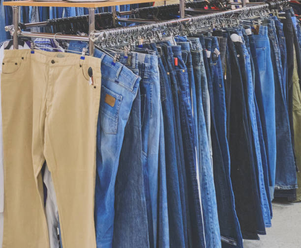 istock Jeans on hangers, second hand clothing. 1245768347