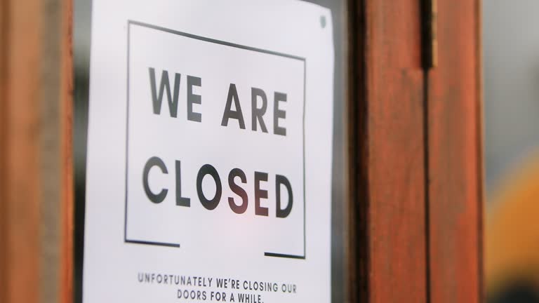 Closed Sign On Retail Store During Covid-19