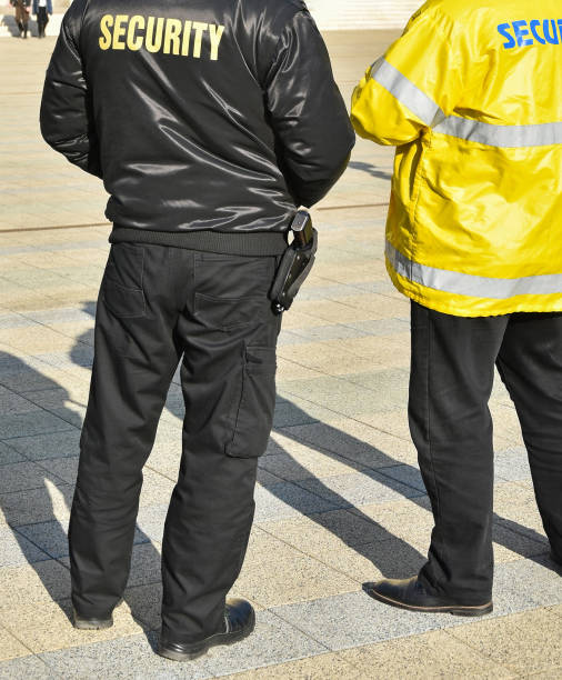istock Security men on the street 1245789946