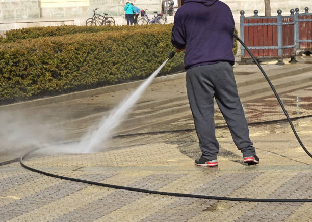 istock Street cleaner at work on the road 1245789953