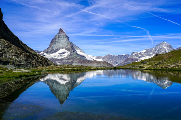 istock Swiss alpine landscape with Matterhorn and RIffelsee 1245794277