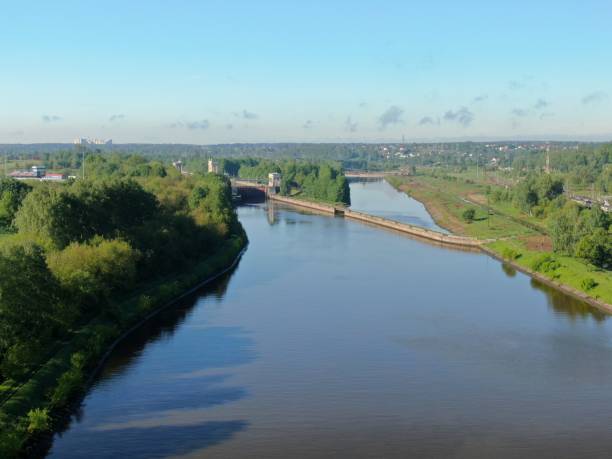 istock Beautiful panoramic landscape from a great height river going beyond the horizon surrounded by green forest in summer with sunny day 1245808126