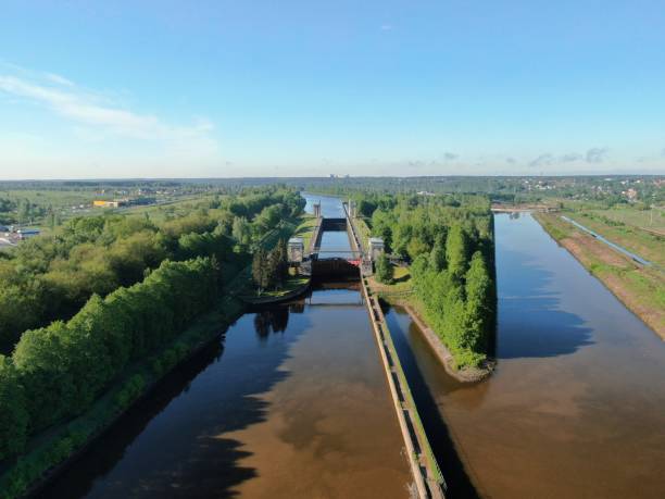 istock Beautiful panoramic landscape from a great height river going beyond the horizon surrounded by green forest in summer with sunny day 1245810837