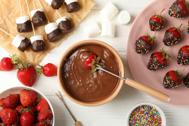 istock Composition with strawberry and marshmallow in chocolate, top view. Chocolate fondue 1245827863