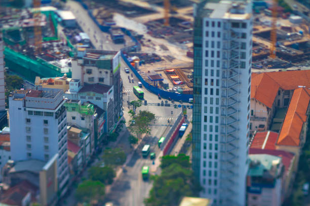 A miniature traffic jam at the busy town in Ho Chi Minh high angle tiltshift A miniature traffic jam at the busy town high angle tiltshift. Ho Chi Minh / Vietnam - 02.25.2020 diorama photos stock pictures, royalty-free photos & images