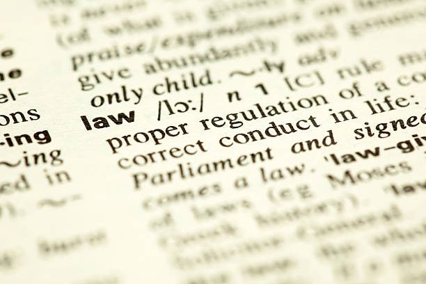 Dictionary definition of the word Law in English. Shallow DOF.