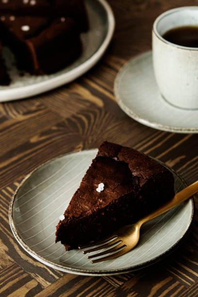 istock Moist Ginger Chocolate cake sliced and sprinkled with sea salt 1245846795