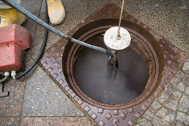 cleaning of sewer stock photo
