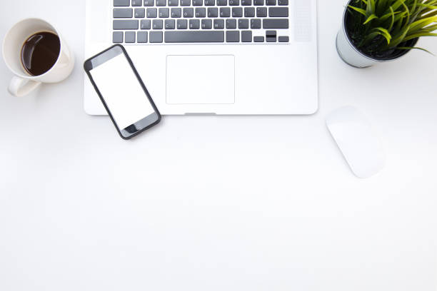 istock work space desk table office top overhead place layout above have phone laptop and mouse for working indoor company 1245855663