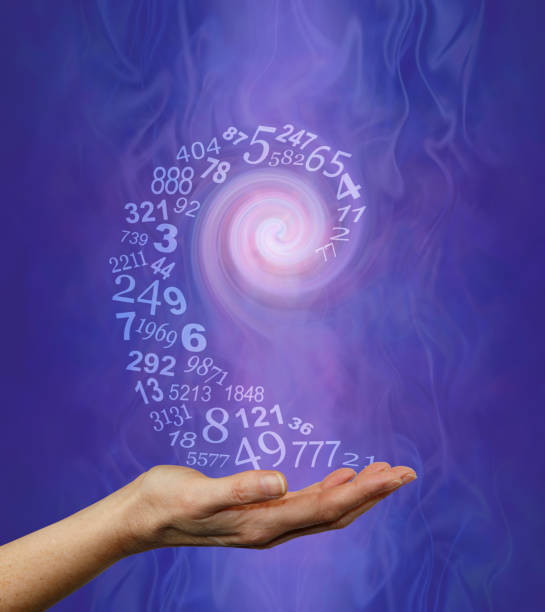 Vortexing Numerology Numbers Concept Background a swirl of semi-transparent random numbers spiralling into the hand of a numerologist ready for a reading on purple blue gaseous ethereal background sense of science and technology stock pictures, royalty-free photos & images