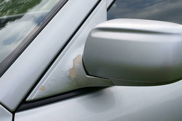 istock The car, peeling paint at rear-view mirror 124588572