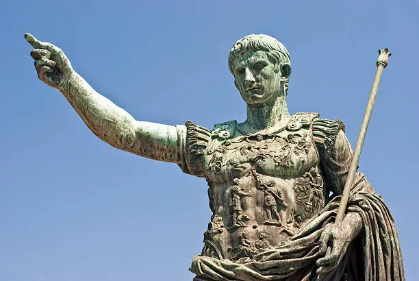 The bronze statue of Emperor Augustus Caesar in Via dei Fori Imperiali, Rome, Italy.
