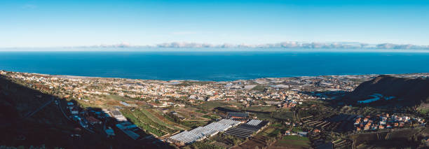 istock High Angle View Of Townscape By Sea Against Sky 1245888739