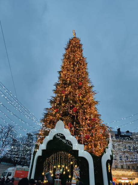 istock Christmas tree in the city with decor and lights 1245909030
