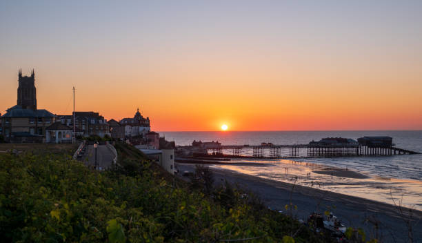 istock Cromer town and pier at sunset. 1245909139