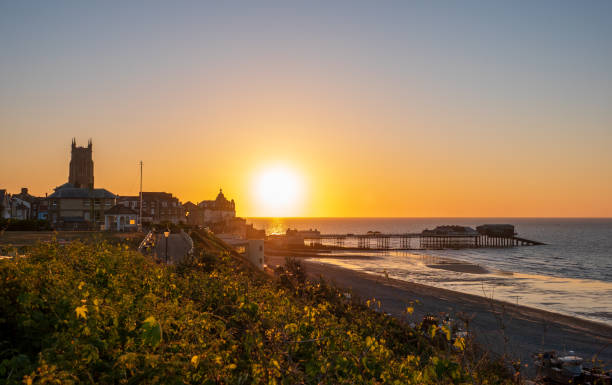 istock Cromer town and pier at sunset. 1245909186